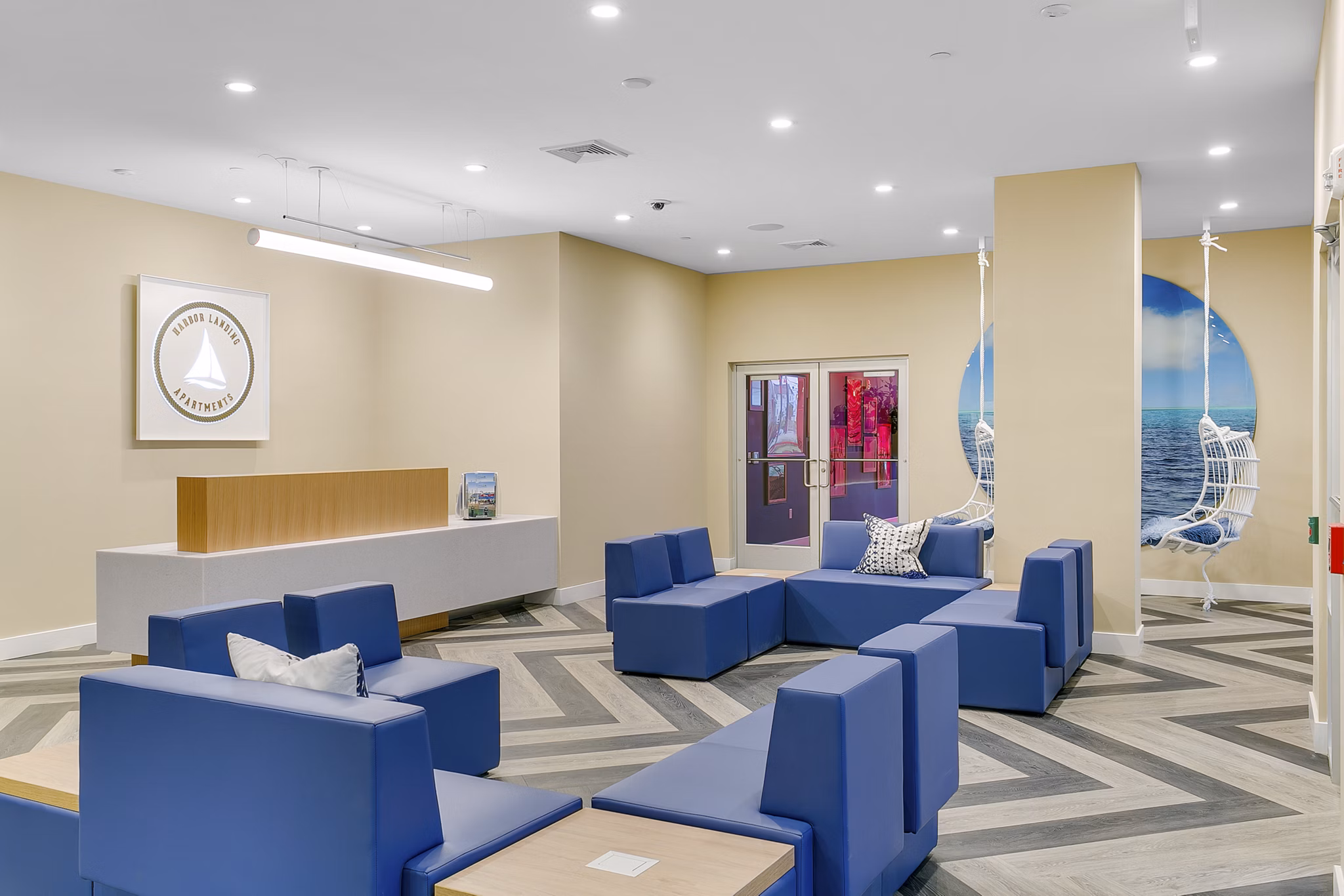 Clubhouse featuring modern design and seating area at Harbor Landing Apartments