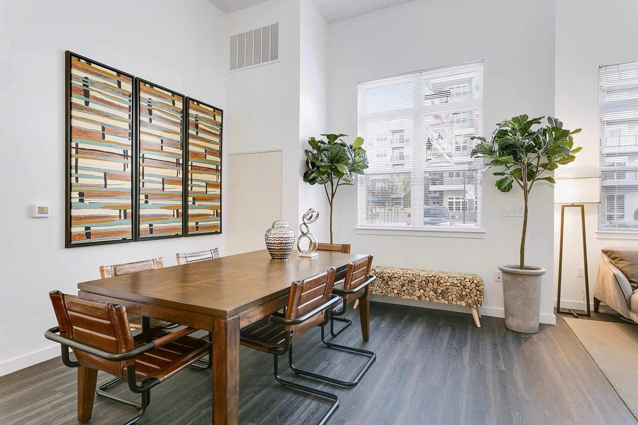 Dining area with modern decor and natural light at Harbor Landing Apartments