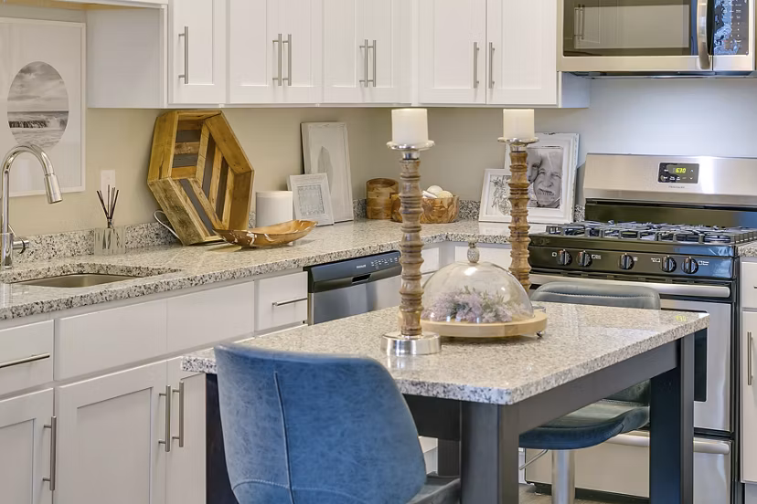 Modern kitchen with stainless steel appliances at Harbor Landing Apartments, Greystar community