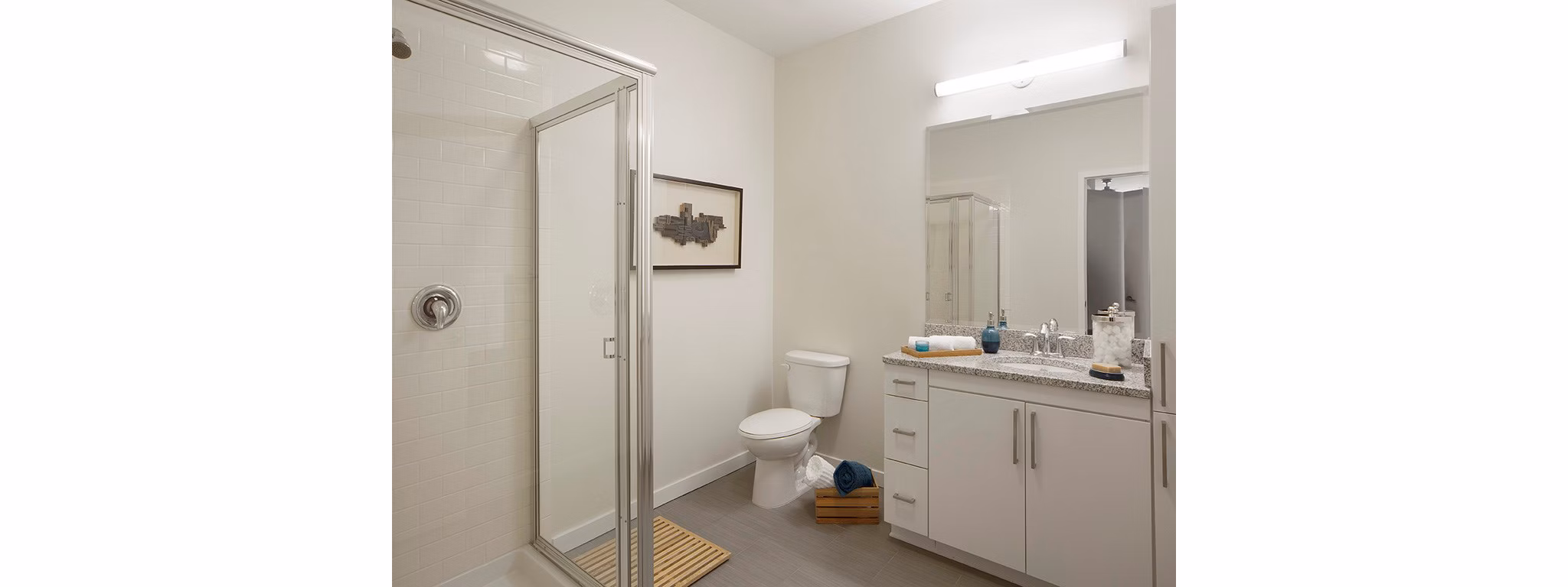 Modern bathroom with sleek fixtures at 75 Tresser Apartments, a Greystar luxury property featuring premium design elements