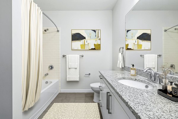 Modern bathroom with sleek fixtures at 75 Tresser Apartments