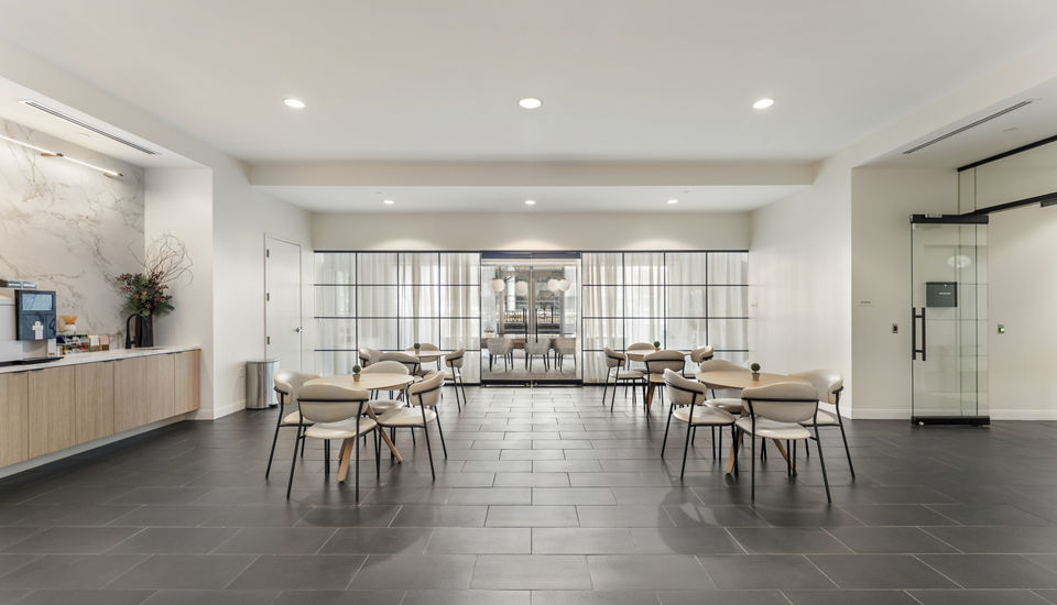 Clubhouse featuring modern decor and seating at 75 Tresser Apartments, a luxury living community