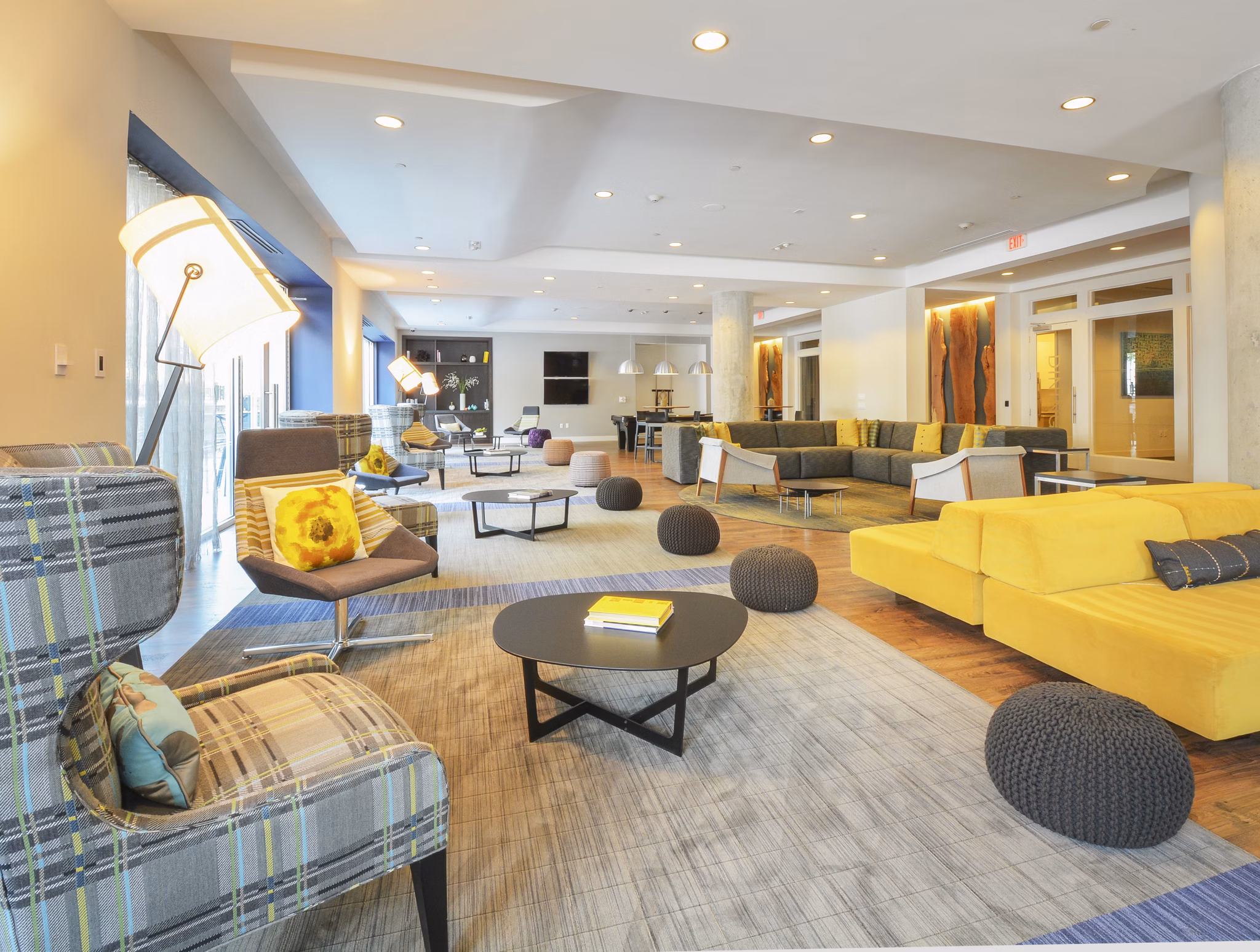 Clubhouse with modern seating and decor at 75 Tresser Apartments, luxury apartments by Greystar in Stamford, Connecticut