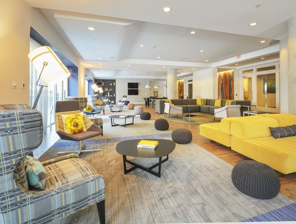 Clubhouse with modern seating and decor at 75 Tresser Apartments, luxury apartments by Greystar in Stamford, Connecticut