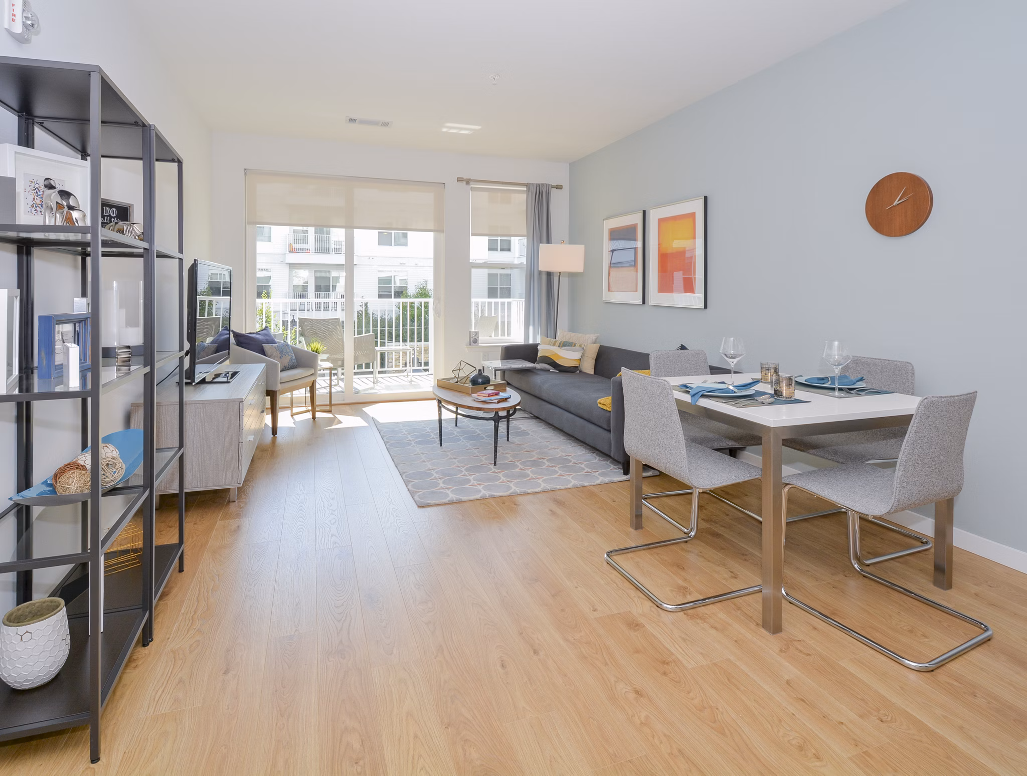 Dining area with modern furnishings and natural light at 75 Tresser Apartments, luxury living in Stamford