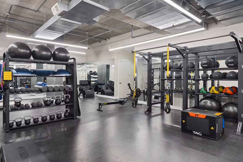 Yoga and spin studio with modern equipment at 75 Tresser Apartments in Stamford