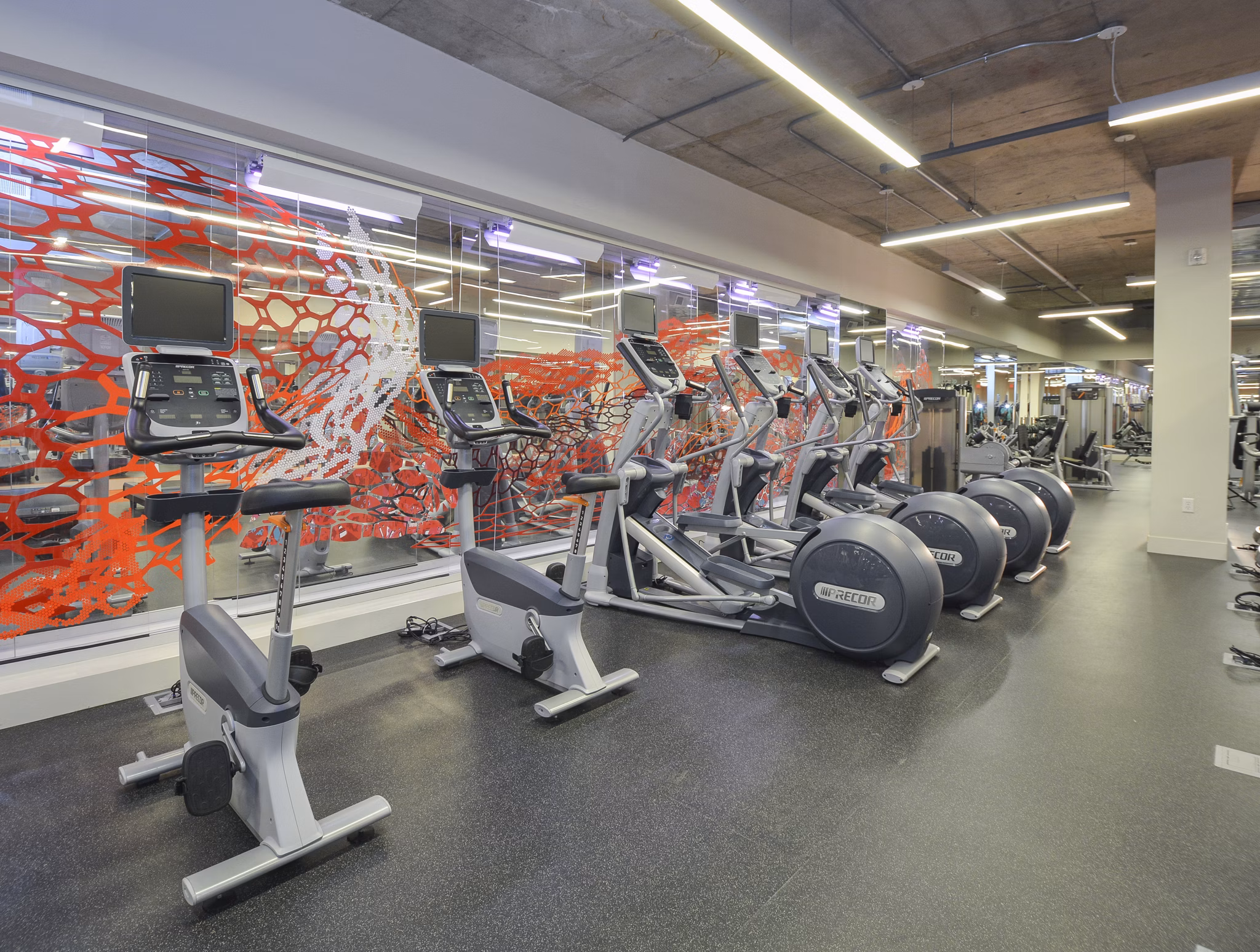 Yoga and spin studio with modern equipment at 75 Tresser Apartments in Stamford