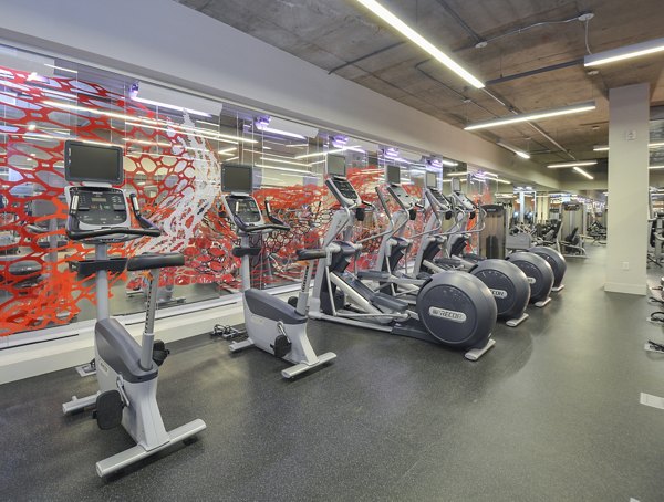 Yoga and spin studio with modern equipment at 75 Tresser Apartments in Stamford