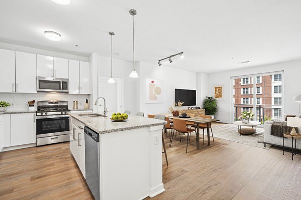 Modern kitchen with stainless steel appliances at 75 Tresser Apartments - luxury living in Stamford