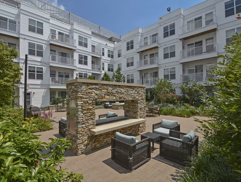 Outdoor fire pit and patio at 75 Tresser Apartments