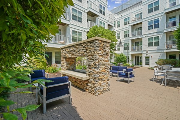Outdoor fire pit and patio at 75 Tresser Apartments