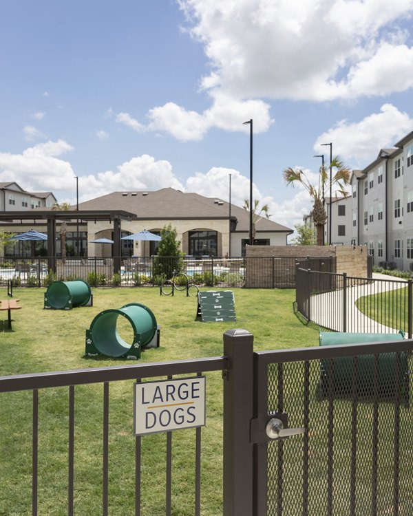 Spacious dog park ideal for pet-friendly living at Prose Buda Apartments