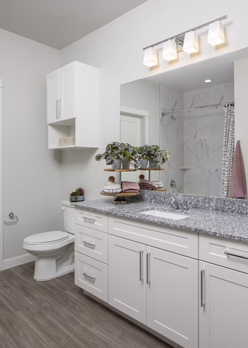 Stylish bathroom with modern fixtures at Prose Solaire Apartments