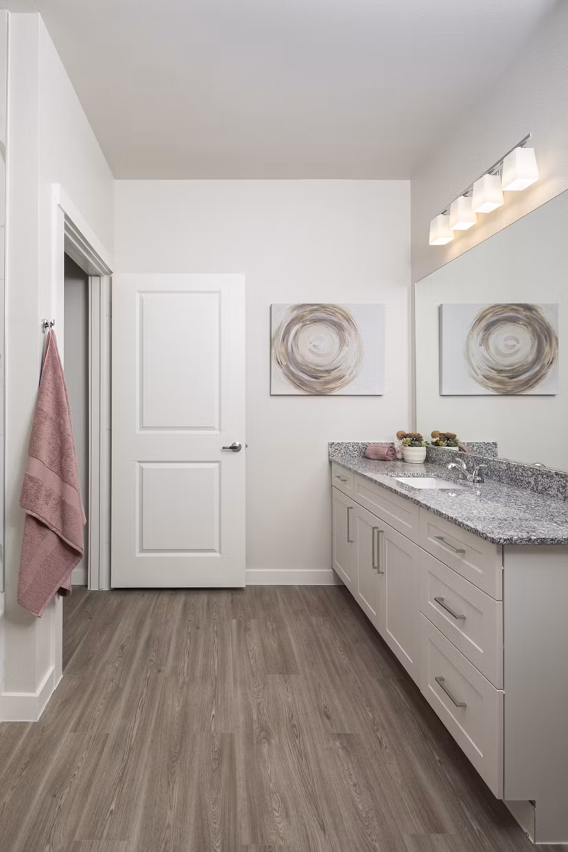 Luxurious bathroom with modern fixtures at Prose Solaire Apartments