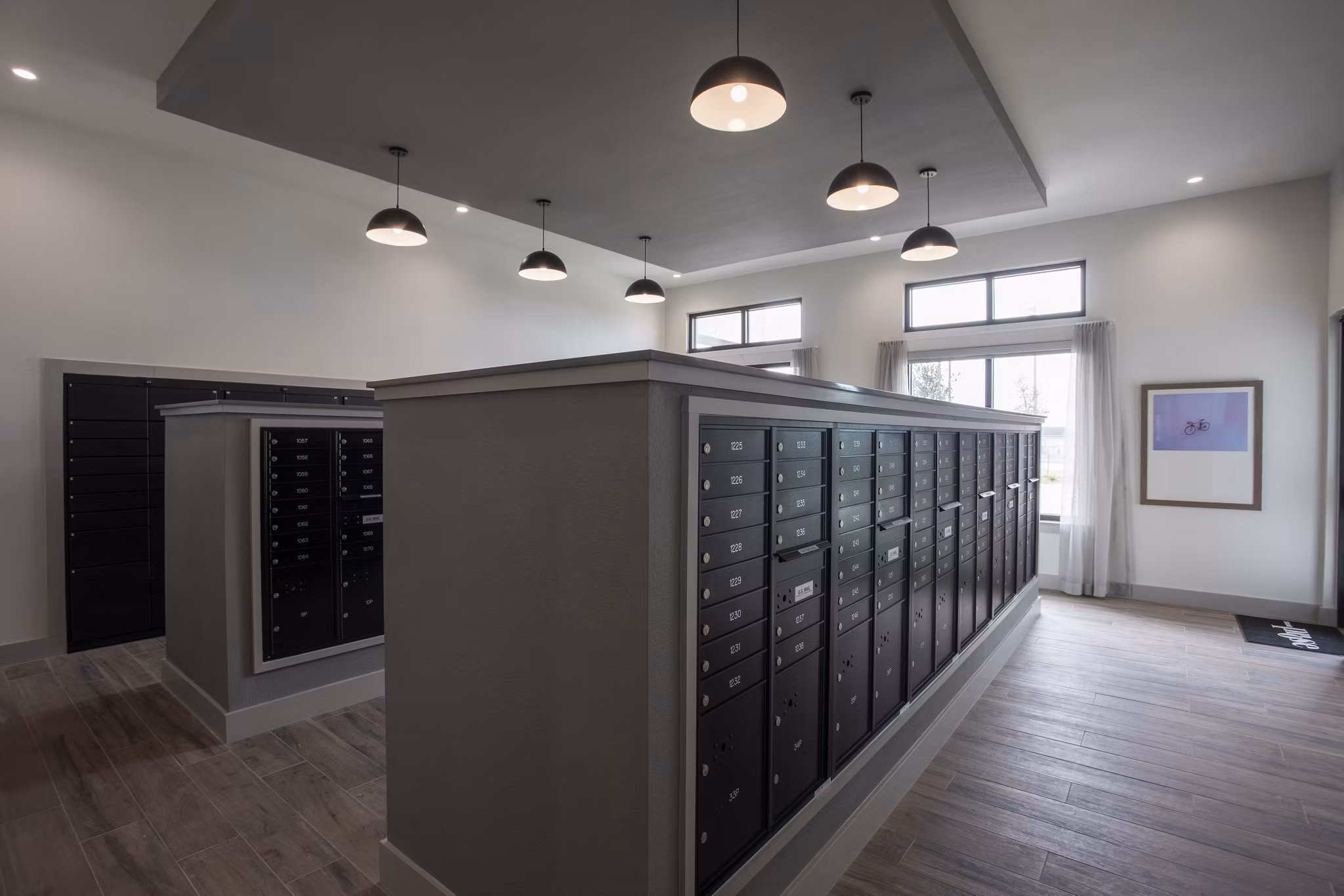Modern mail room with secure parcel lockers at Prose Solaire Apartments
