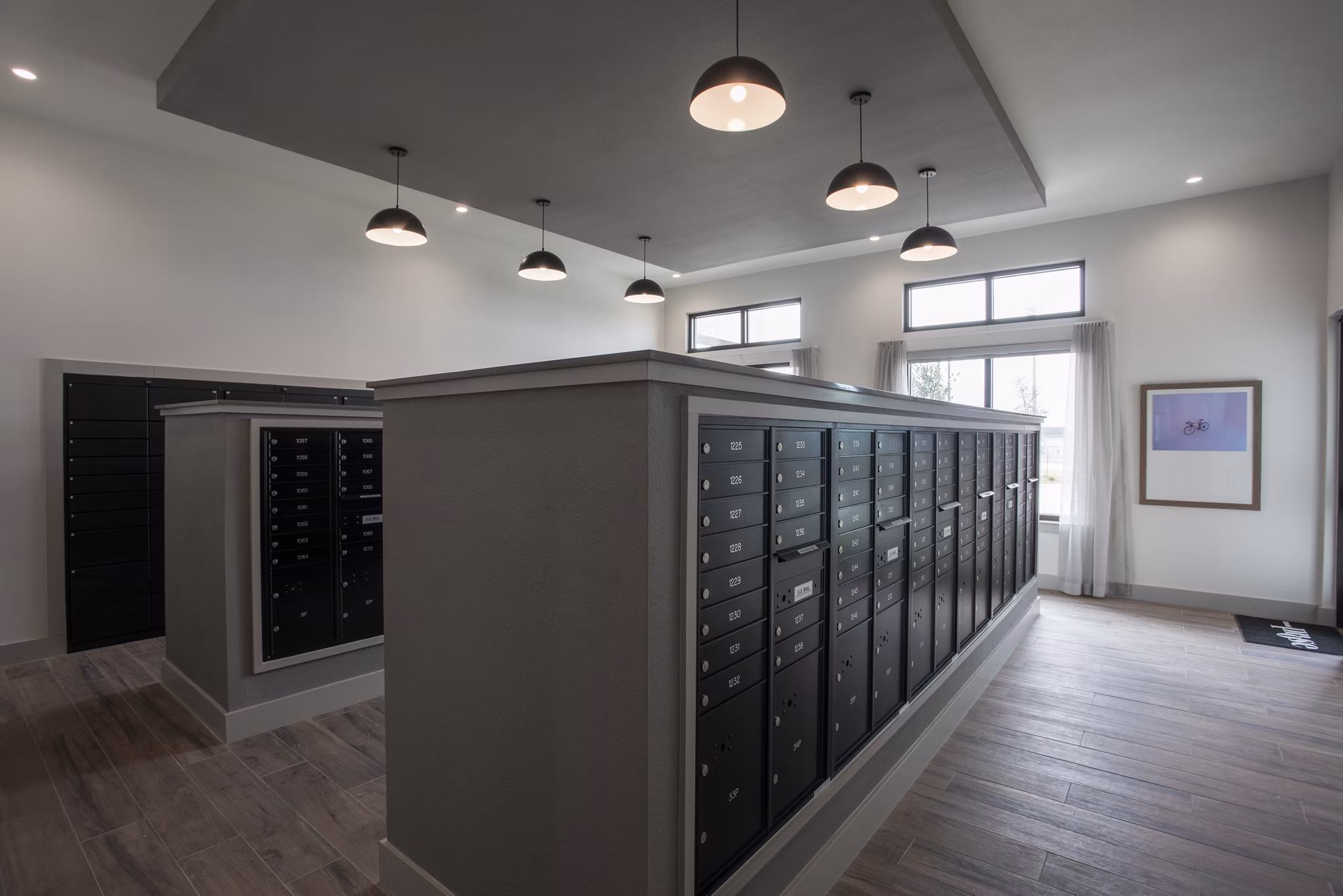 Modern mail room with secure parcel lockers at Prose Solaire Apartments