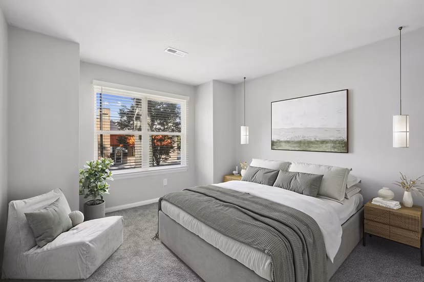 Stylish bedroom with contemporary design at Luna Pointe Apartments