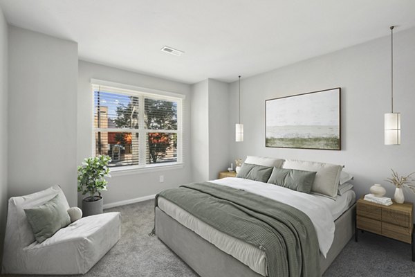 Stylish bedroom with contemporary design at Luna Pointe Apartments