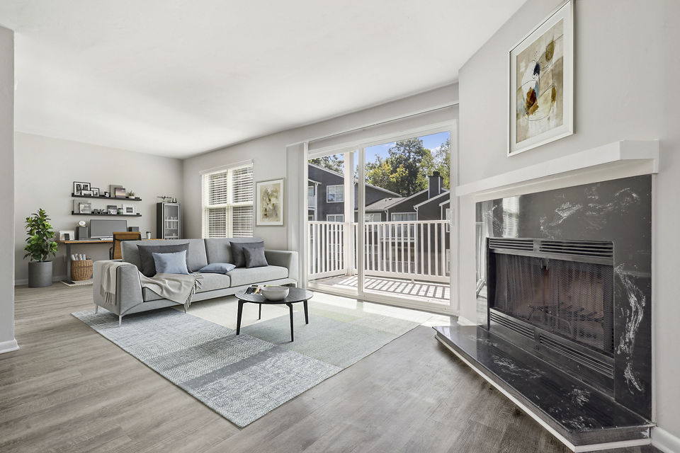 Cozy living room with modern decor at Luna Pointe Apartments