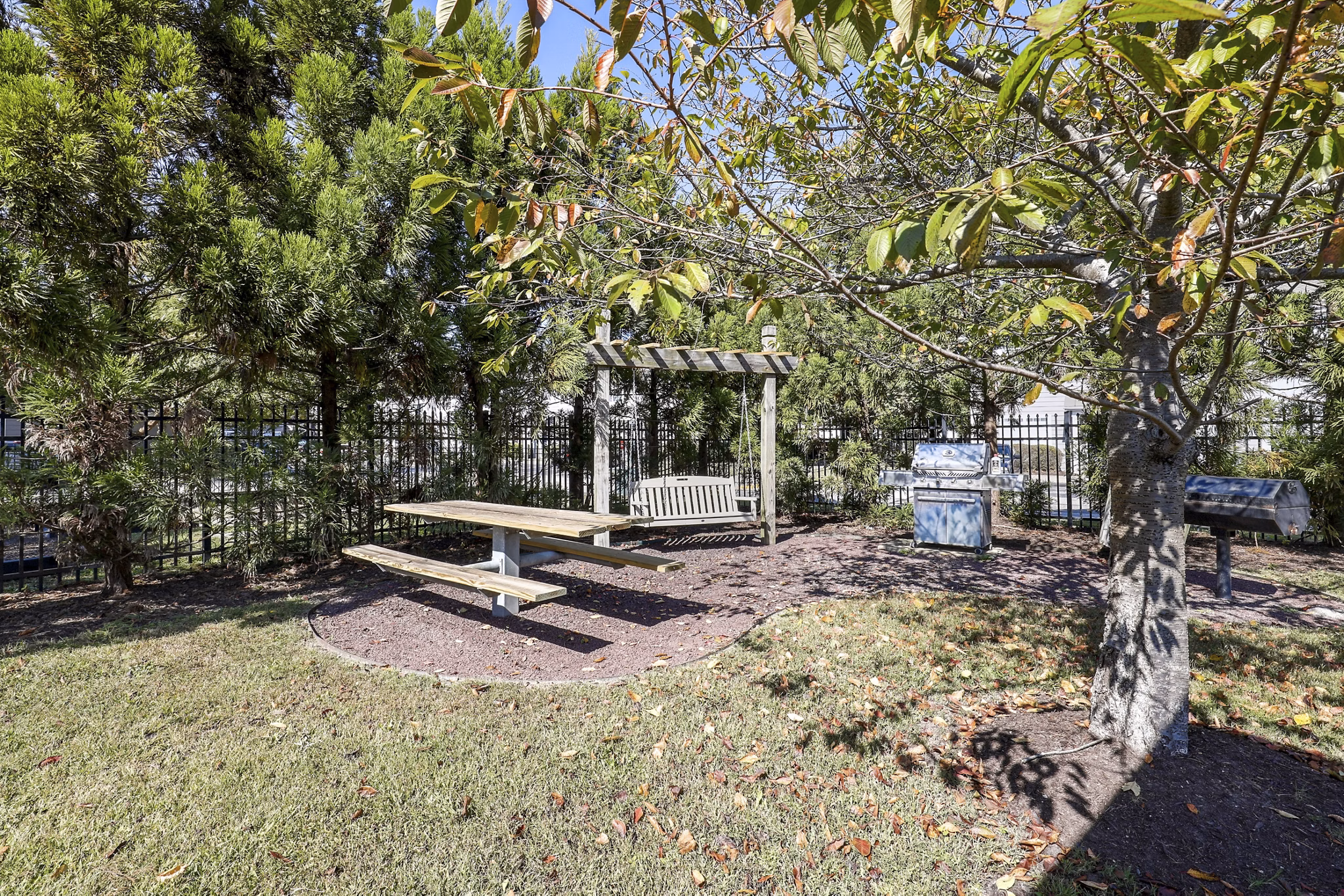 grill area/patio at Trail Creek Apartments
