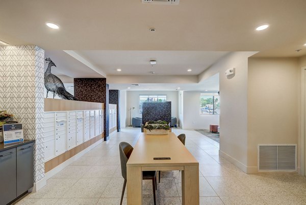 Mailroom with modern parcel lockers at Encore Novo Apartments