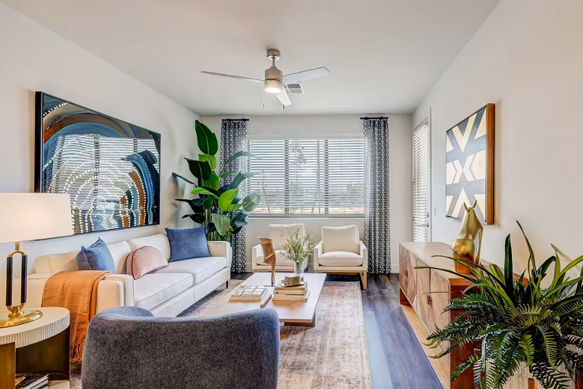 Spacious living room with modern decor at Encore Novo Apartments, Greystar luxury homes in an elevated lifestyle setting