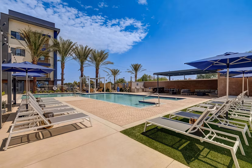 Luxury infinity pool at Encore Novo Apartments offering relaxation and leisure