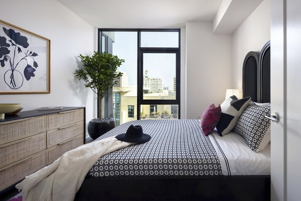 Contemporary bedroom with stylish decor at Broadstone Inkwell Apartments