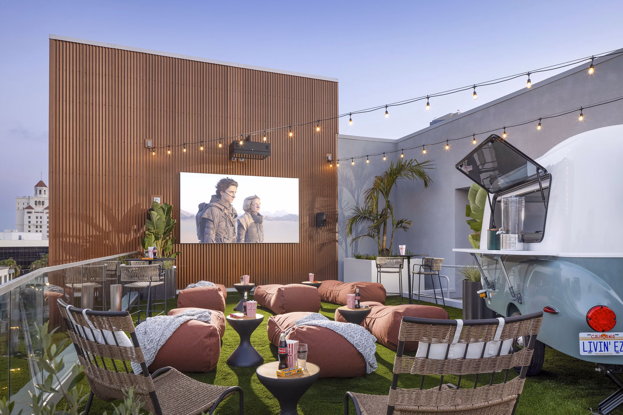Modern clubhouse featuring theater and outdoor patio at Broadstone Inkwell Apartments Perfect for luxury living and social gatherings
