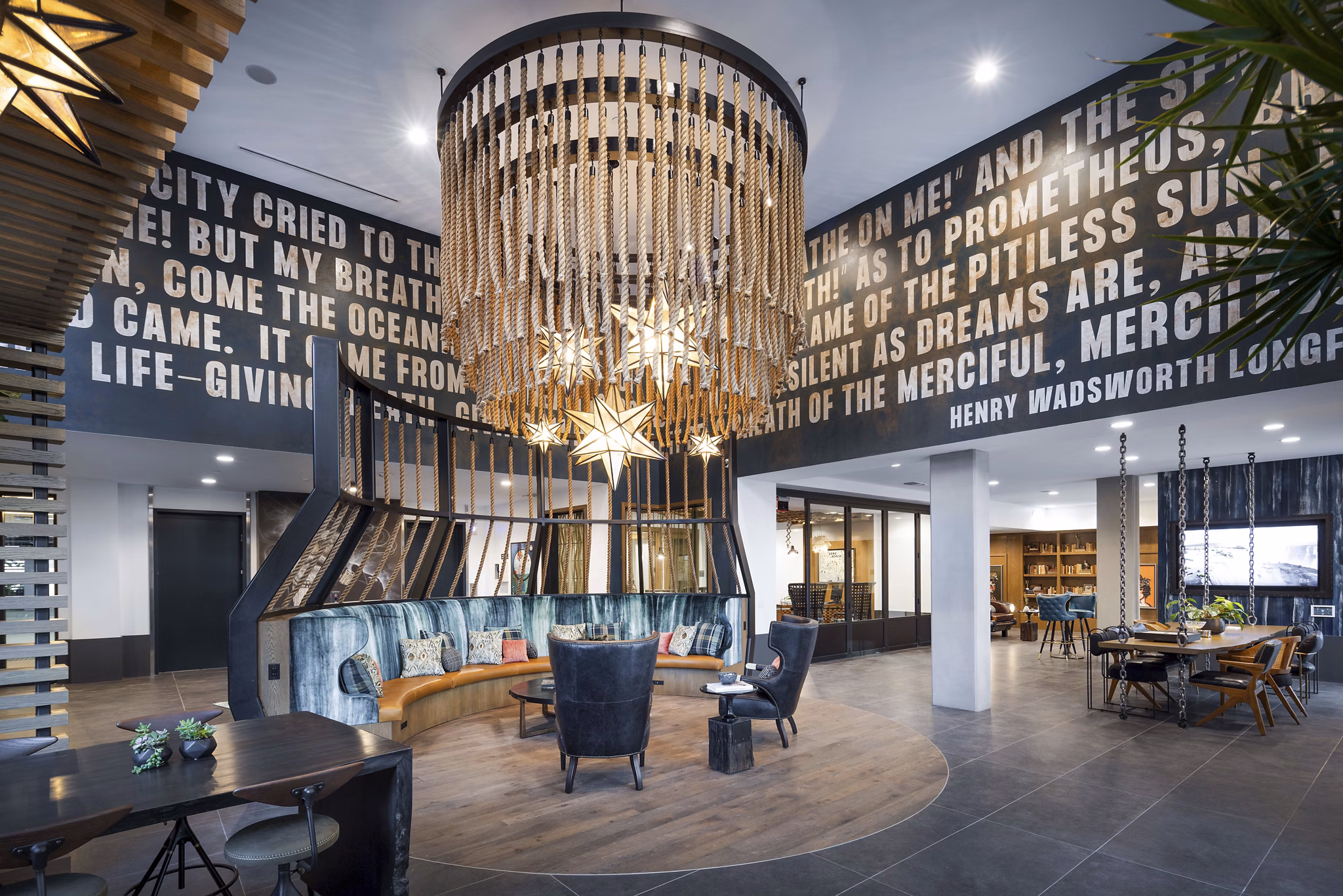 Clubhouse with modern design and inviting seating at Broadstone Inkwell Apartments