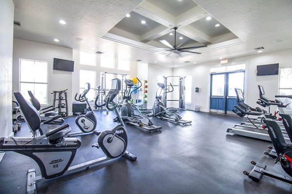 fitness center at Legends Lake Creek Apartments