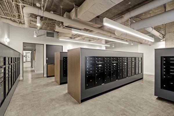 Mail room equipped with secure parcel lockers at Skyglass Apartments