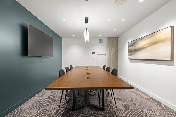 Meeting space equipped with modern technology at Skyglass Apartments