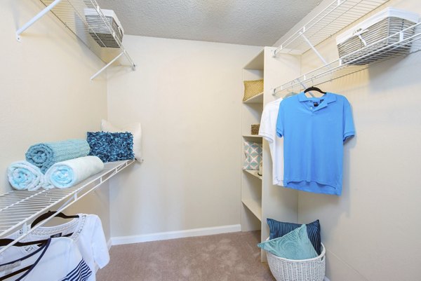 Walk-in closet with ample storage space at Westmount at Winter Park Apartments