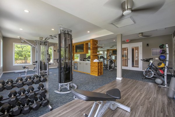 Fitness center with modern equipment at Westmount at Winter Park Apartments for active lifestyles