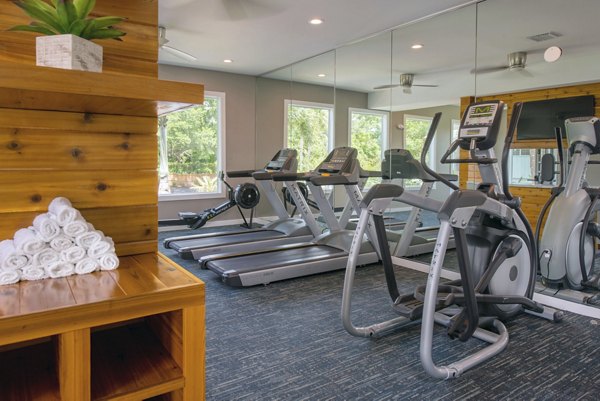 Fully-equipped fitness center with modern machines at Westmount at Winter Park Apartments