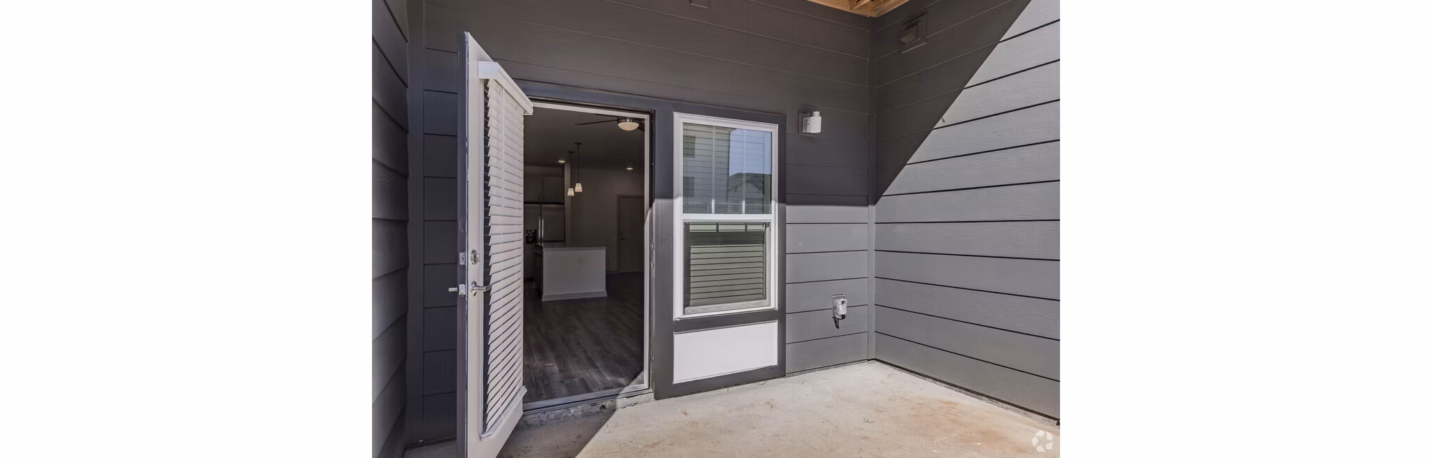 Advenir at Walker's Ridge: Contemporary luxury apartments showcasing lush landscaping