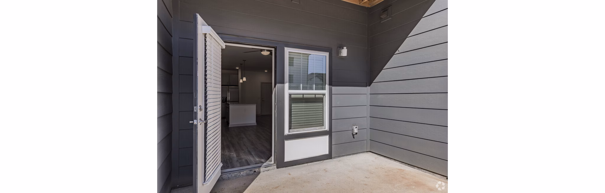 Advenir at Walker's Ridge: Contemporary luxury apartments showcasing lush landscaping