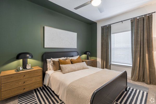Spacious bedroom with contemporary decor at Advenir at Walker's Ridge Apartments