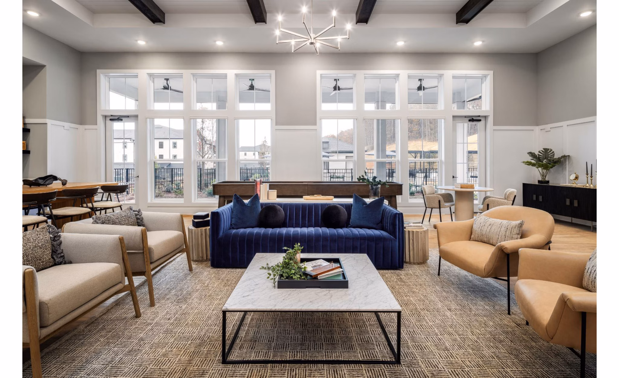 Clubhouse featuring modern design and comfortable seating at Advenir at Walker's Ridge Apartments