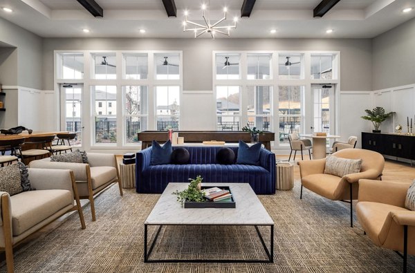 Clubhouse featuring modern design and comfortable seating at Advenir at Walker's Ridge Apartments