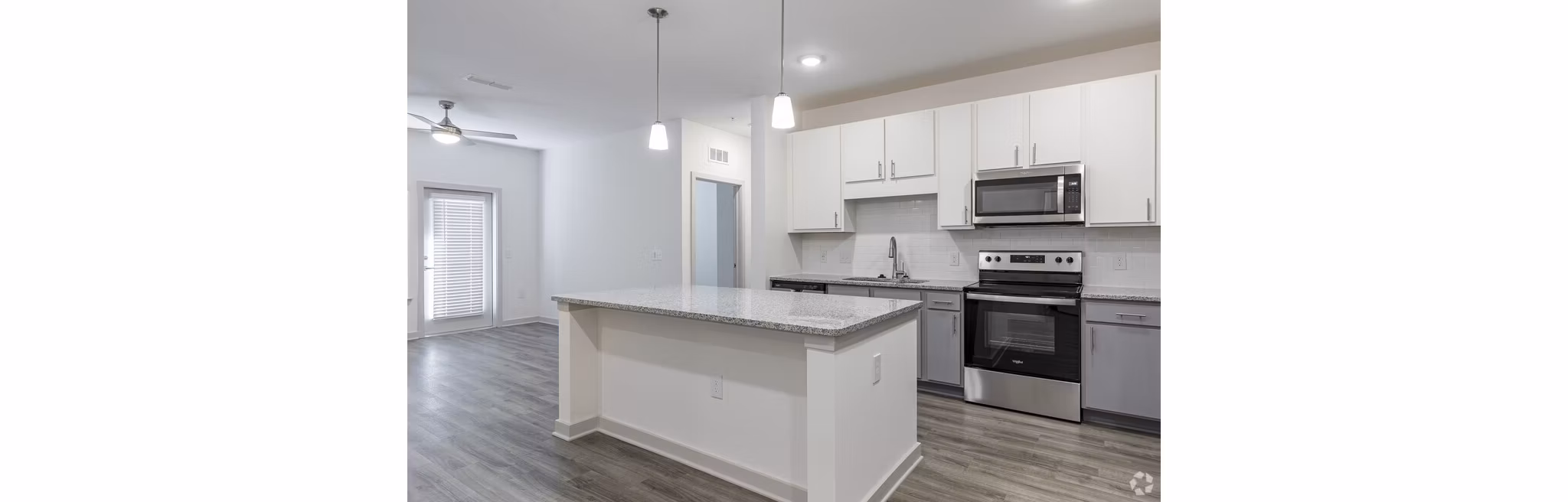 Modern kitchen featuring stainless steel appliances at Advenir at Walker's Ridge Apartments