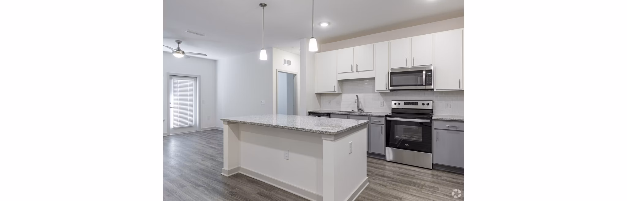 Modern kitchen featuring stainless steel appliances at Advenir at Walker's Ridge Apartments