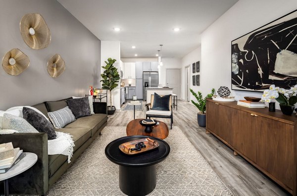 Spacious living room with stylish decor in Advenir at Walker's Ridge Apartments