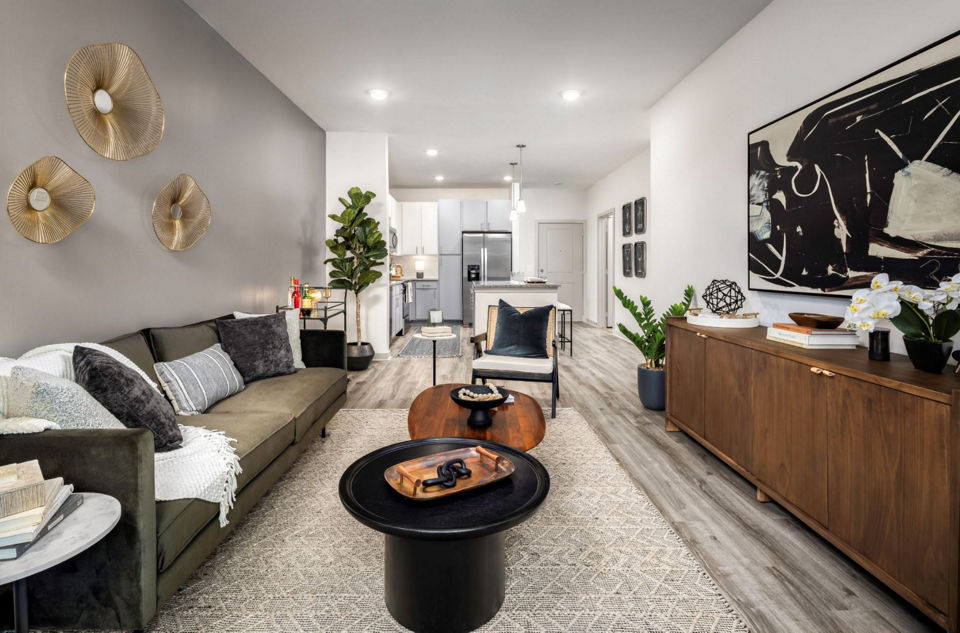 Spacious living room with stylish decor in Advenir at Walker's Ridge Apartments