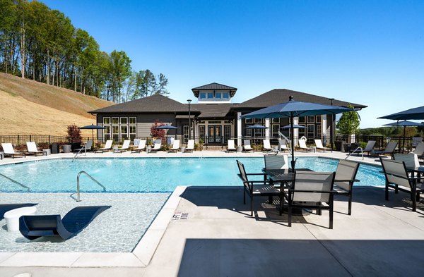 Inviting outdoor pool at Advenir at Walker's Ridge Apartments, perfect for relaxing and socializing in a luxurious setting