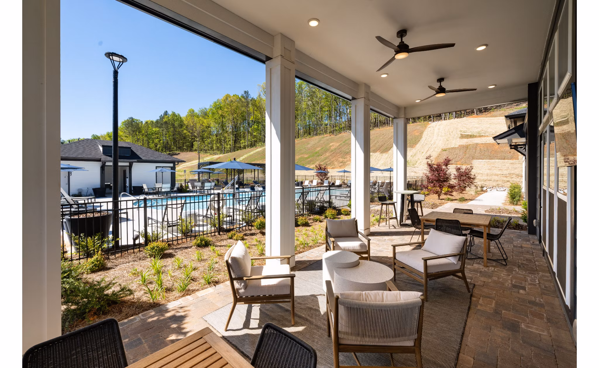 Spacious patio area with modern seating at Advenir at Walker's Ridge Apartments, perfect for outdoor relaxation and entertaining