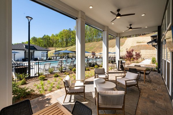 Spacious patio area with modern seating at Advenir at Walker's Ridge Apartments, perfect for outdoor relaxation and entertaining