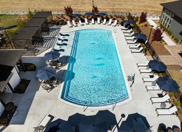 Advenir at Walker's Ridge: Scenic view of luxury apartments with lush landscaping