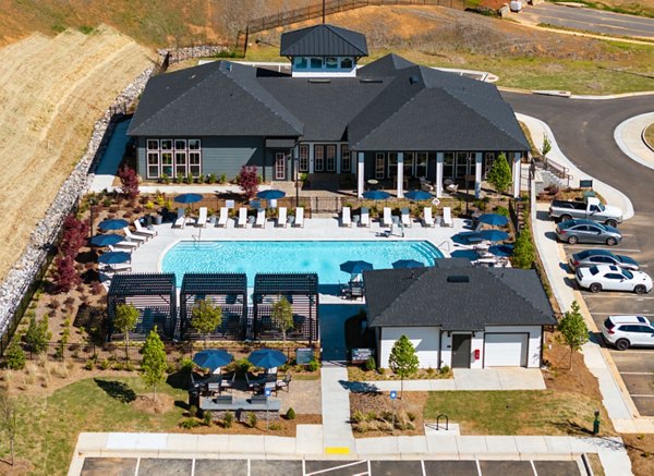 Scenic view of luxury Advenir at Walker's Ridge Apartments, featuring lush greenery and modern design